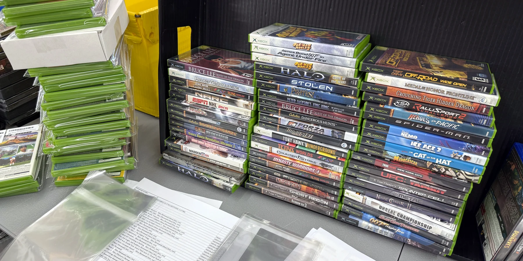 Original Xbox games bought from sellers, waiting to be checked in at our Trenton shop.